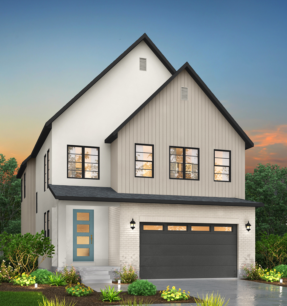 Modern two-story Ivory home at dusk